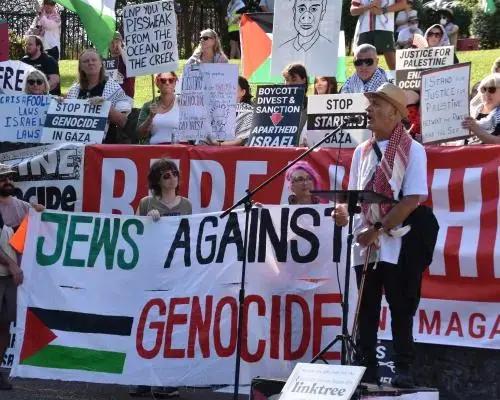 Queensland Protesters Challenge Legal Ban on Controversial Slogans